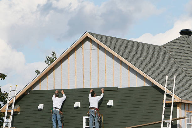 Professional Emergency Siding Repair technician working in Goshen, OH